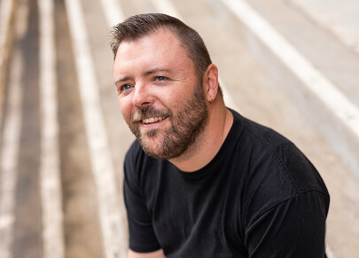 A photo of a man smiling