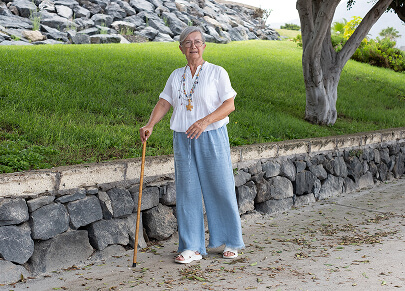 Photo of a person with a walking stick