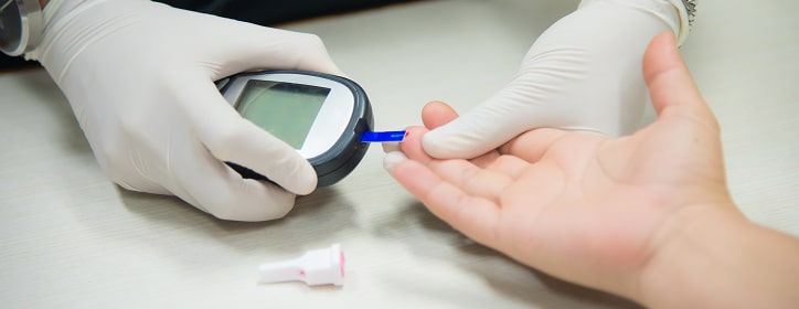 A diabetes testing kit being administered