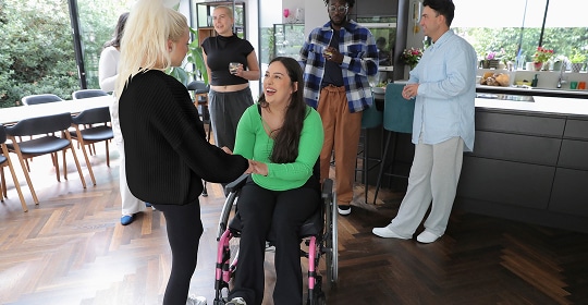 Photo of a person visiting friends