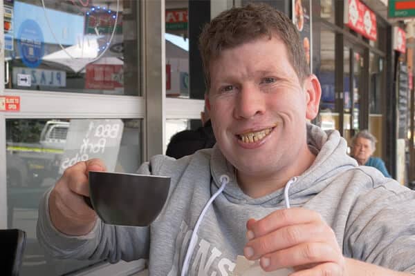 Photo of Scott smiling to camera