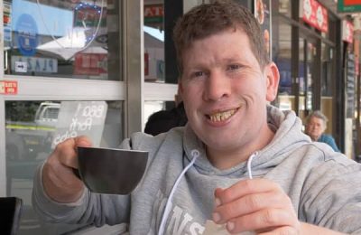 Photo of Scott smiling to camera